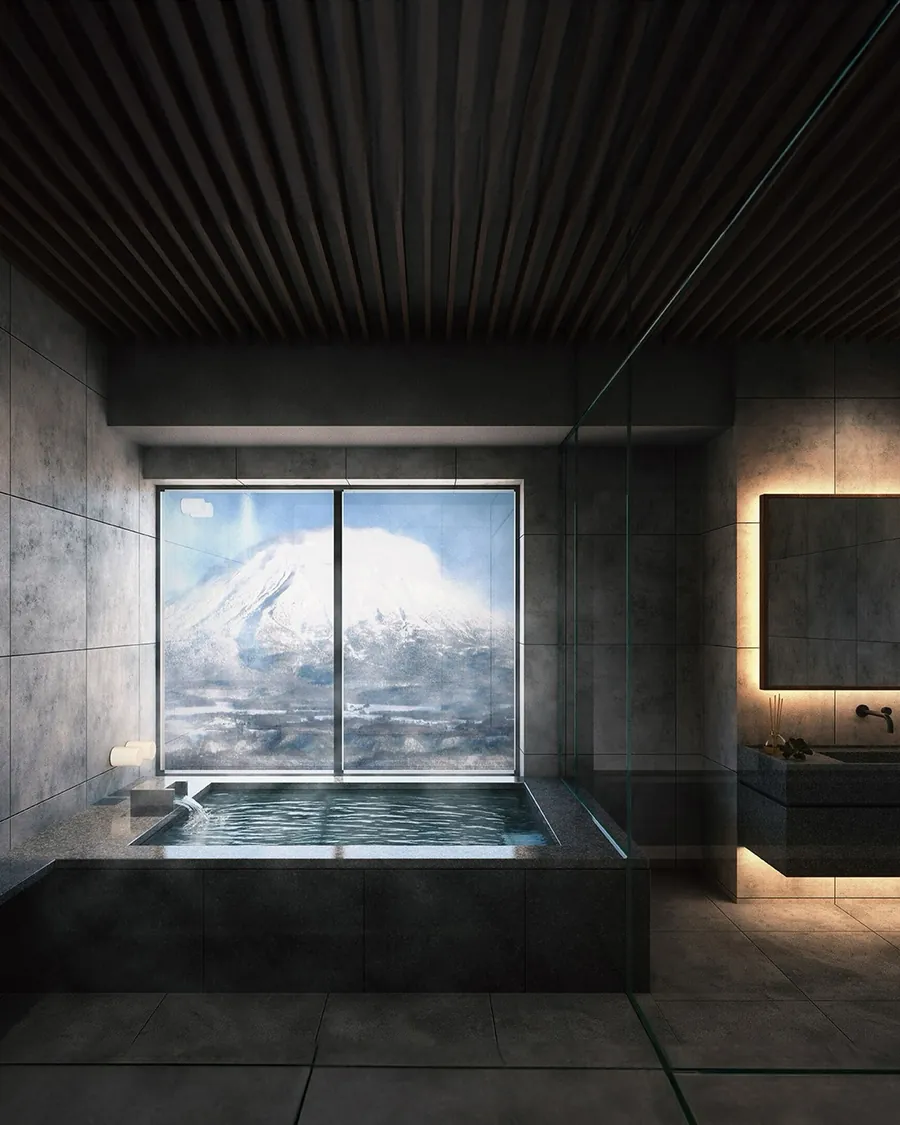 Japanese tiled bathtub with a window framing Mt. Yotei